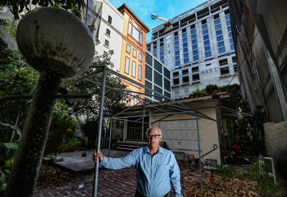 Orlando Capote has refused to move out of the house his parents bought in 1989, even as the Plaza Coral Gables development towers above him.