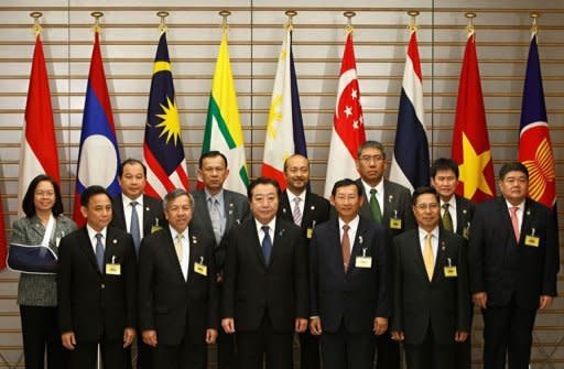 Japan's Prime Minister Yoshihiko Noda (front C) and economic ministers from members of the Association of Southeast Asian Nations (ASEAN) pose for a photograph at the start of their meeting as part of a four-day "ASEAN Road Show" at Noda's official residence in Tokyo. Southeast Asian and European foreign ministers meet in Brunei on Friday to chart a "new chapter" in their relations