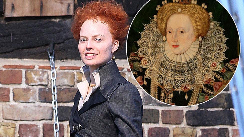 Crikey… Robbie transforms into Elizabeth I – Credit: Splash