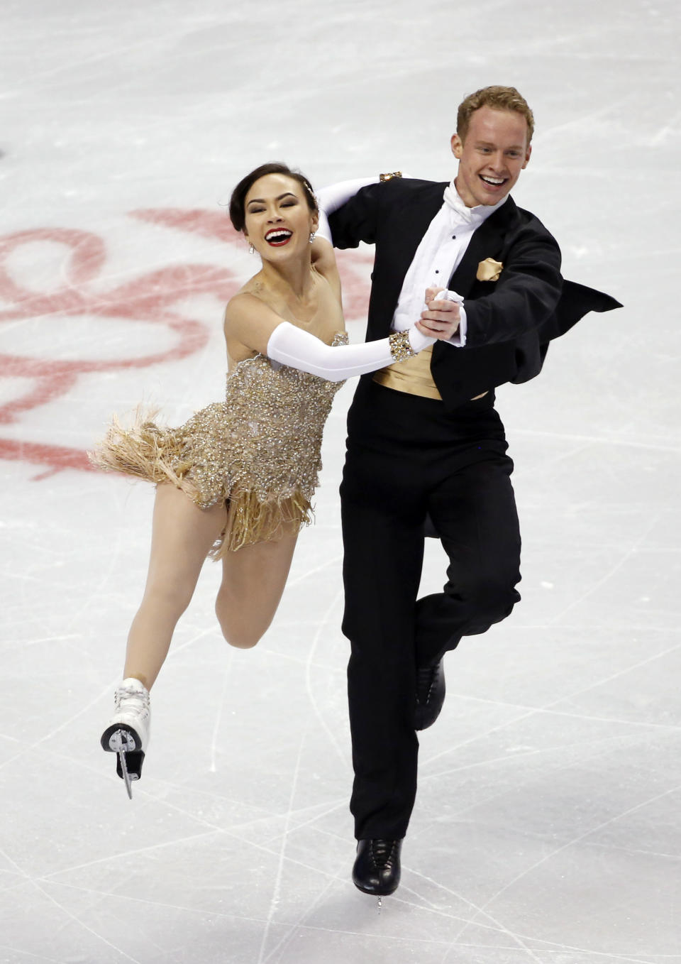 Madison Chock and Evan Bates skate during the ice dance short program at the U.S. Figure Skating Championships in Boston, Friday, Jan. 10, 2014. (AP Photo/Elise Amendola)