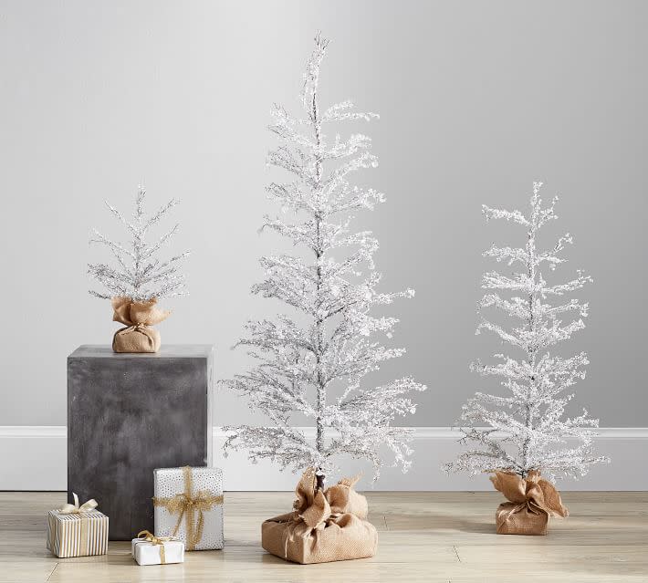 <p><a href="https://go.redirectingat.com?id=74968X1596630&url=https%3A%2F%2Fwww.potterybarn.com%2Fproducts%2Fpre-lit-snowy-crystal-trees%2F&sref=https%3A%2F%2Fwww.thepioneerwoman.com%2Fholidays-celebrations%2Fg37635843%2Fwhite-christmas-tree-decorations%2F" rel="nofollow noopener" target="_blank" data-ylk="slk:Shop Now;elm:context_link;itc:0;sec:content-canvas" class="link ">Shop Now</a></p><p>Pre-Lit Snowy Crystal Trees</p><p>potterybarn.com</p><p>$99.00</p><span class="copyright">Pottery Barn</span>