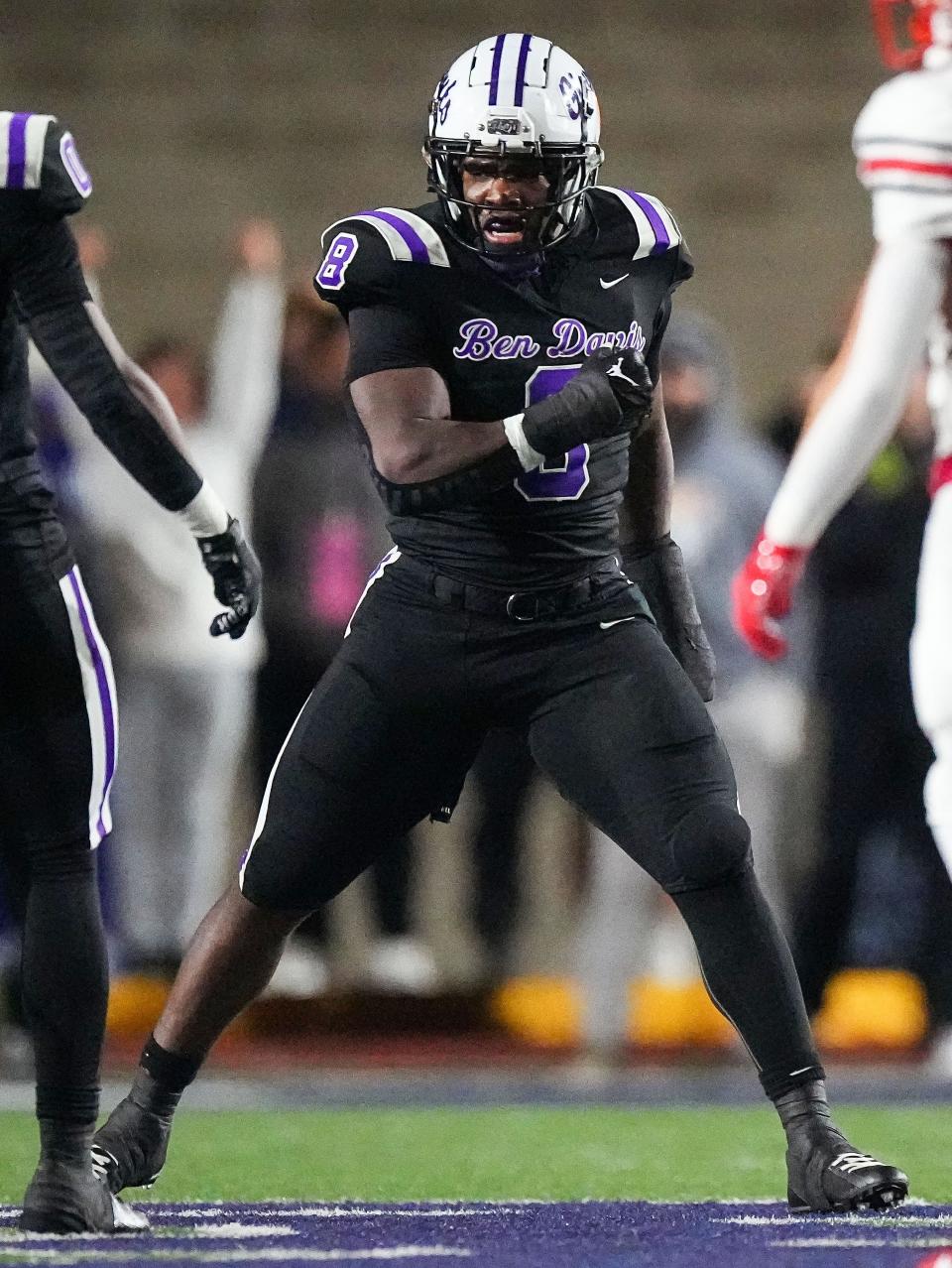 Ben Davis Giants linebacker Nylan Brown (8) yells in excitement Friday, Nov. 17, 2023, during the IHSAA semi state championship game at Ben Davis High School in Indianapolis. The Ben Davis Giants defeated the Center Grove Trojans in overtime, 37-34.