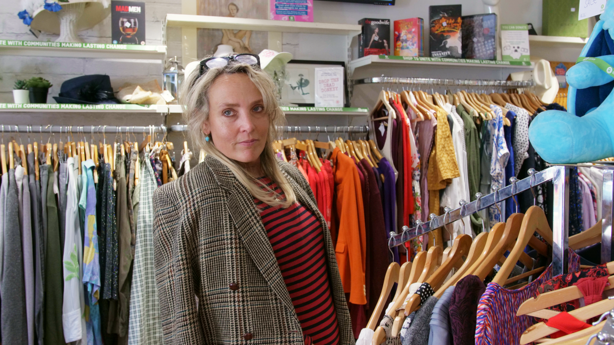 Bay Garnett at the Oxfam shop in Notting Hill, London as she puts together looks for the charity's September runway show