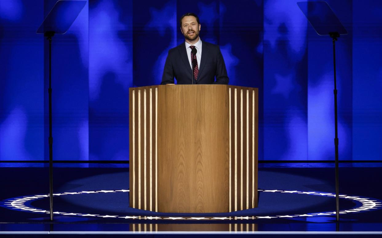 Jason Carter, grandson of former U.S. President Jimmy Carter, speaks on stage during the second day of the Democratic National Convention