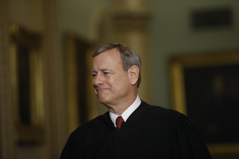 Supreme Court Chief Justice John Roberts walks to the Senate chamber at the Capitol on Thursday. (Photo: Matt Rourke/Associated Press)