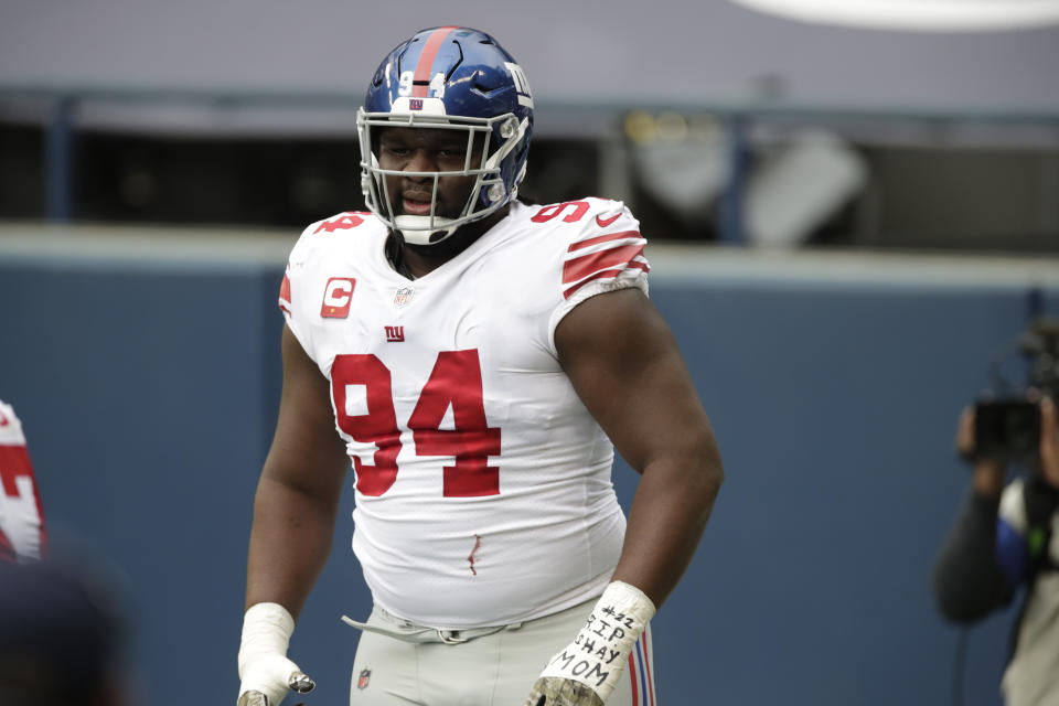 FILE - In this Sunday, Dec. 6, 2020, file photo, New York Giants nose tackle Dalvin Tomlinson looks on against the Seattle Seahawks in an NFL football game, in Seattle. In a deal announced late Monday, March 15, 2021, the Minnesota Vikings have agreed to terms on a contract with former New York Giants defensive tackle Tomlinson. (AP Photo/Larry Maurer, File)