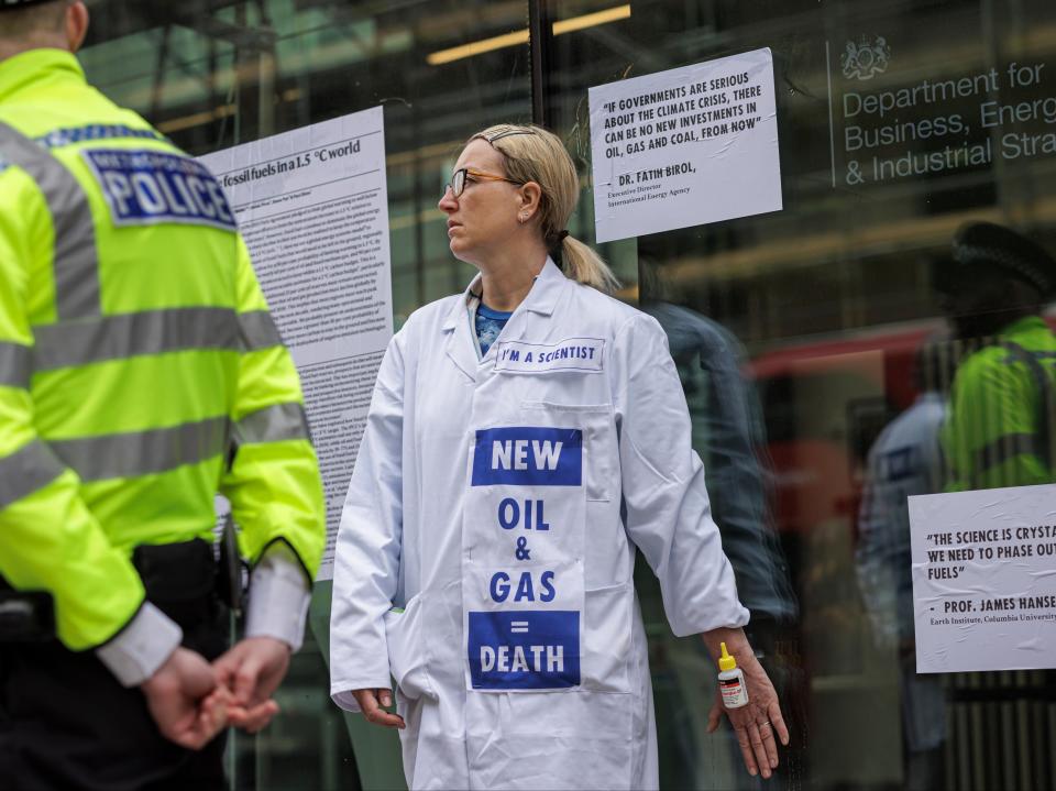 Extinction Rebellion activists protesting outside the Department for Business, Energy, and Industrial Strategy (Getty Images)