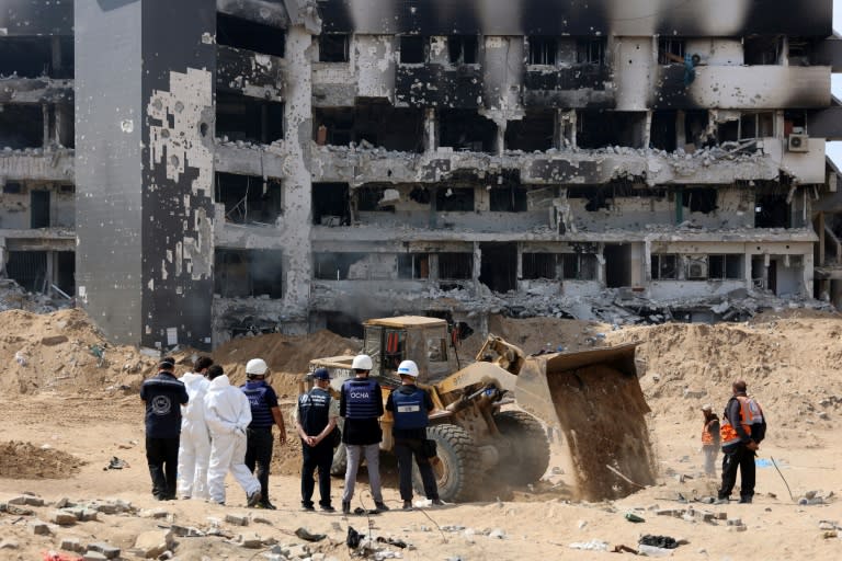A United Nations team surveys the damage to Gaza's Al-Shifa Hospital where Barsh worked during an inspection visit last month (-)