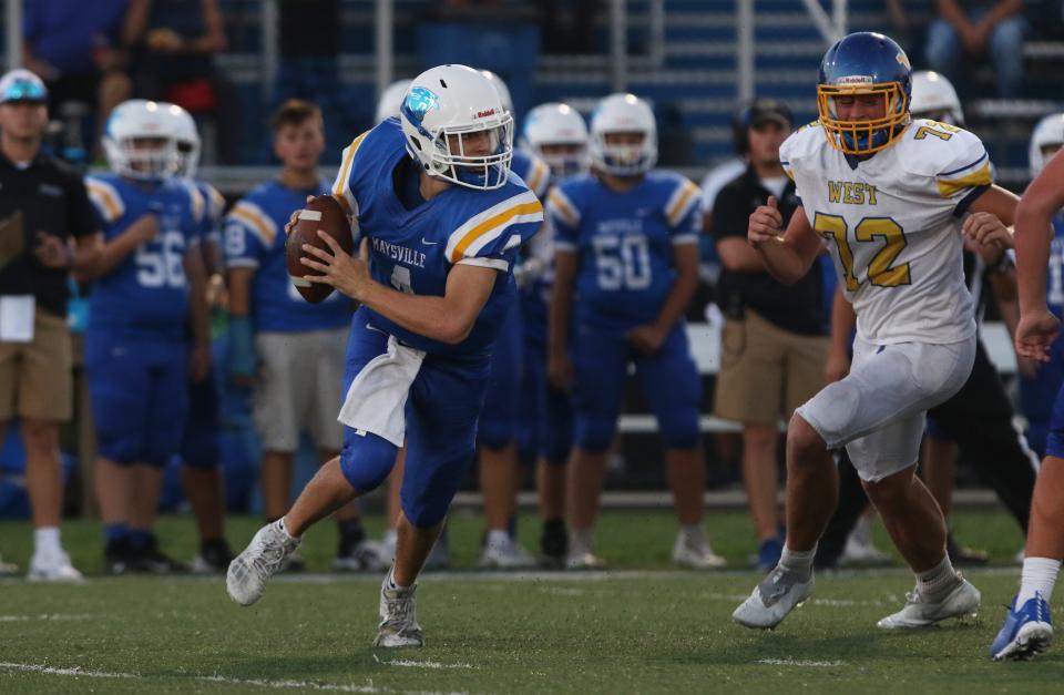 Maysville's Alex Bobb scrambles against West Muskingum last season. Bobb will be a second-year starter at quarterback, as the Panthers return nearly all their skill players from last season.