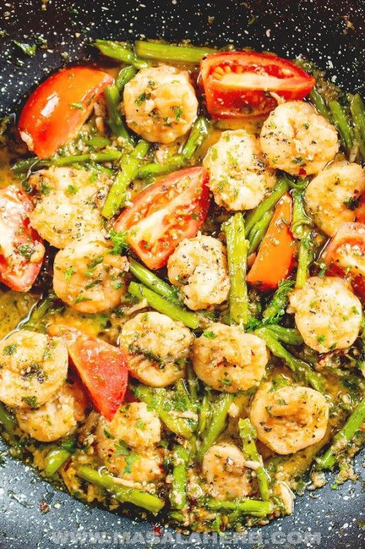 Masala Herb<p>A tasty Italian style meal in only 15 minutes? This Shrimp Scampi recipe will be your next favourite.</p><p><strong>Get the recipe: <a href="https://www.masalaherb.com/shrimp-scampi-asparagus/" rel="sponsored" target="_blank" data-ylk="slk:Copycat Olive Garden Shrimp Scampi with Asparagus and Tomato;elm:context_link;itc:0;sec:content-canvas" class="link ">Copycat Olive Garden Shrimp Scampi with Asparagus and Tomato</a></strong></p>
