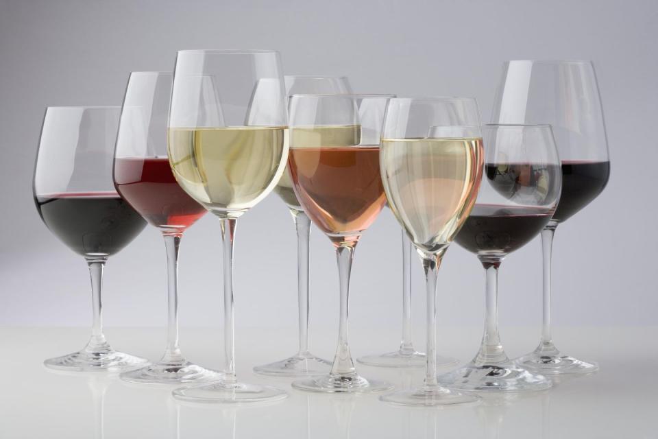 closeup of glasses of different wines