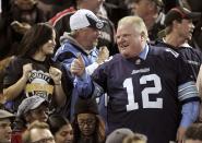 Toronto Mayor Rob Ford watches the CFL eastern final football game between the Toronto Argonauts and the Hamilton Tiger Cats in Toronto, November 17, 2013. REUTERS/Fred Thornhill (CANADA - Tags: SPORT FOOTBALL)