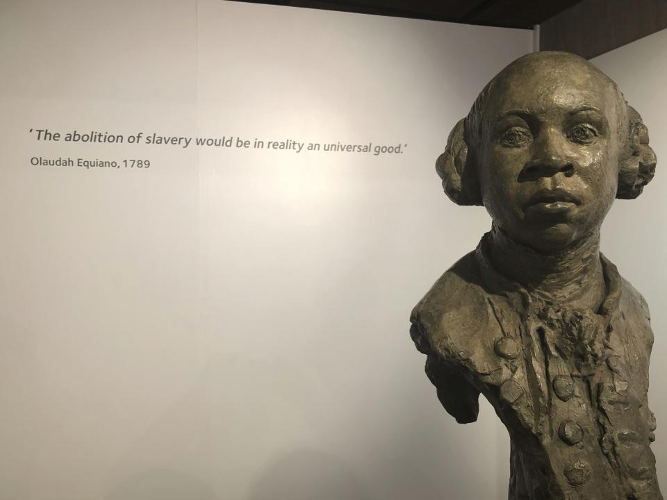 In this Nov. 24, 2019 photo, a sculpture of former slave and later abolitionist writer Olaudah Equiano is displayed at the International Slavery Museum in Liverpool, England. The museum seeks to tell the story of the enslavement of people from Africa and how the British city benefited from human bondage. (AP Photo/Russell Contreras)