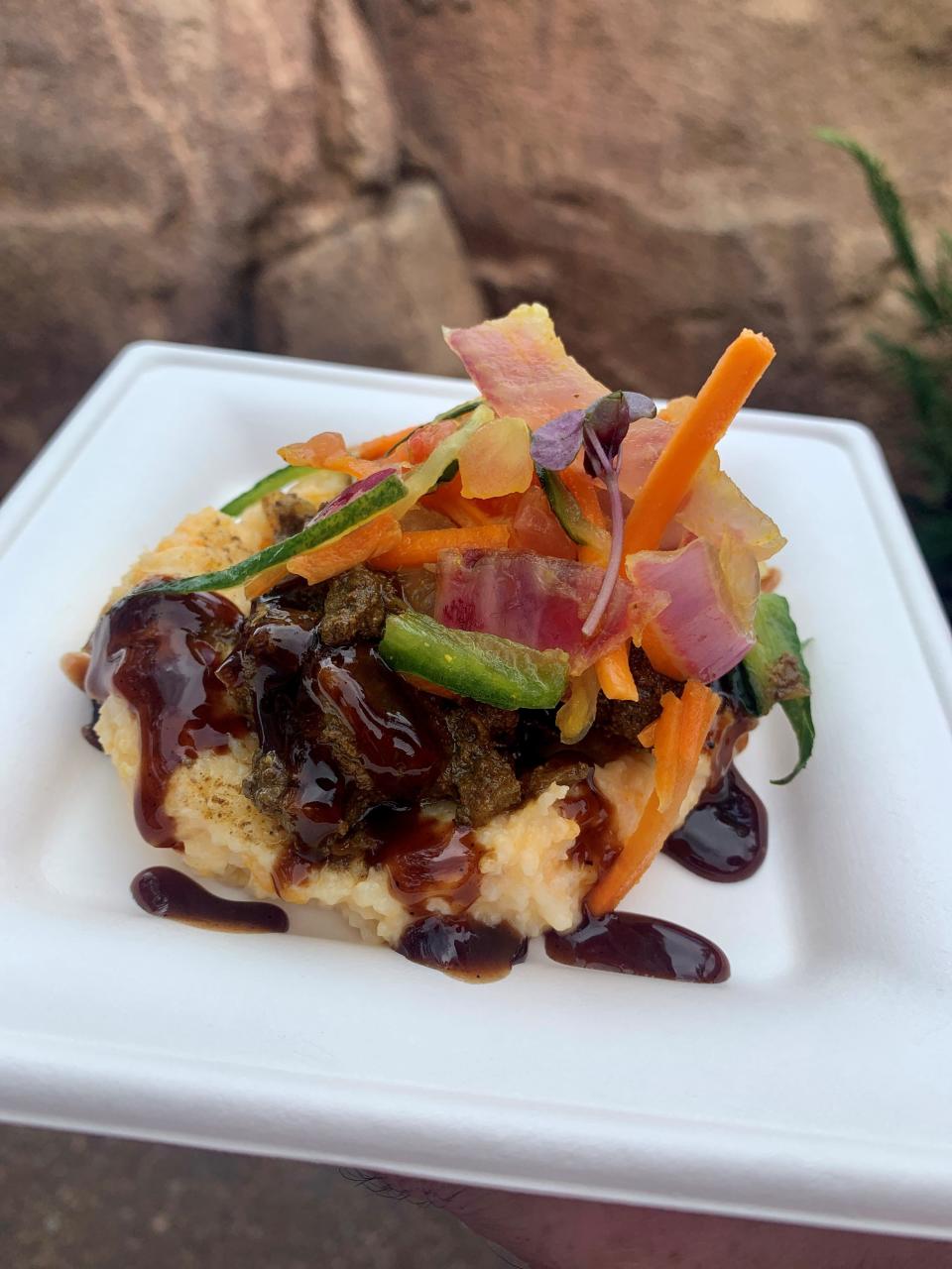 The Kenyan coffee barbecued beef tenderloin at the Kenya kitchen at the EPCOT International Food & Wine Festival was served with sweet potato and corn mealie pap and kachumbari slaw.