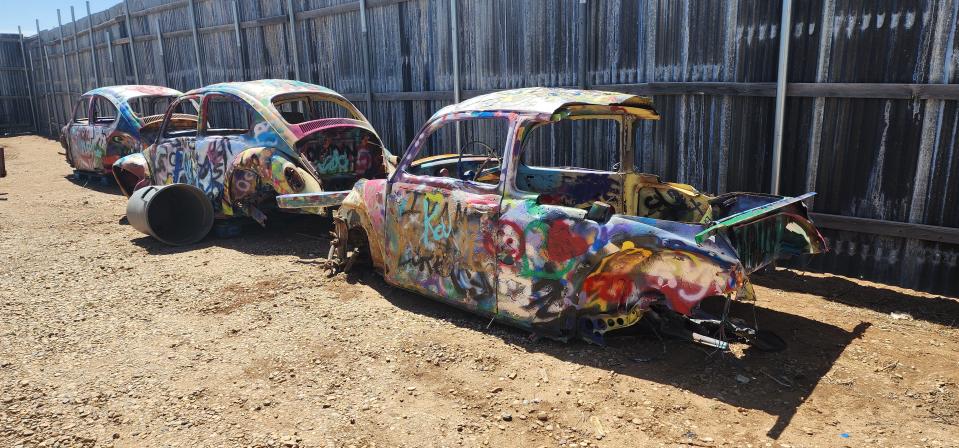 Three of the original VW Bugs from the Slug Bug Ranch are seen Friday on the grounds at Starlight Ranch. The attraction is being reconstructed across from the building off the interstate, in front of the RV ranch.