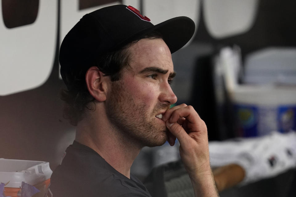 Cleveland Guardians starting pitcher Shane Bieber sits in the dugout during the third inning of a baseball game against the Chicago White Sox in Chicago, Sunday, July 24, 2022. (AP Photo/Nam Y. Huh)