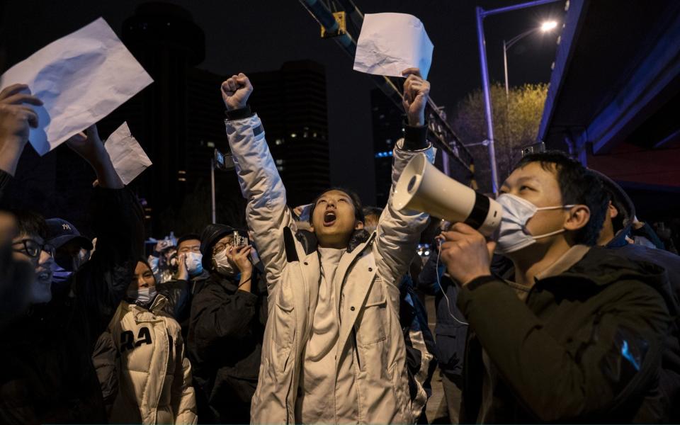 People have taken to the streets in multiple Chinese cities to protest against strict zero-Covid measures - Getty Images