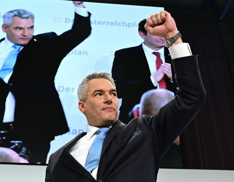 Karl Nehammer, Austria's Chancellor and Austrian People's Party (OeVP) Chairman, reacts during the party's presentation of the "Austria Plan". Helmut Fohringer/APA/dpa