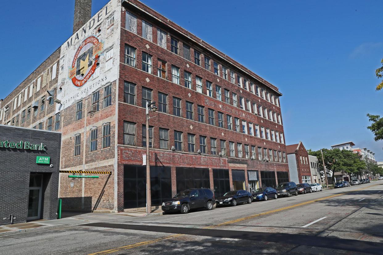 American Family Insurance Co. has dropped plans to convert the former Mandel Graphic Solutions building, 1311-1325 N. King Drive, into a downtown Milwaukee office.