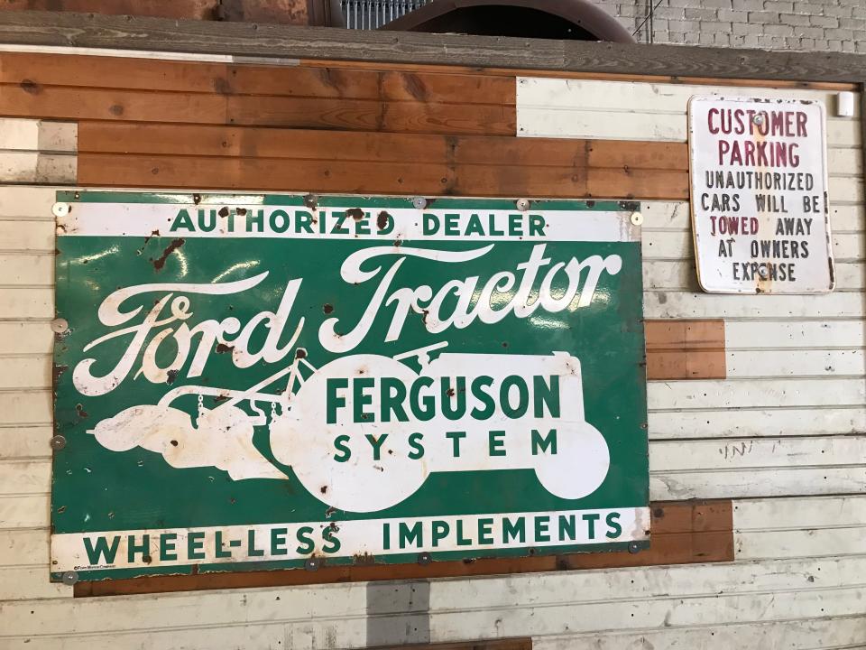 The decor at Uptown Garage Brewing Co. features auto themes, with classic signs, license plates and other automotive elements.
