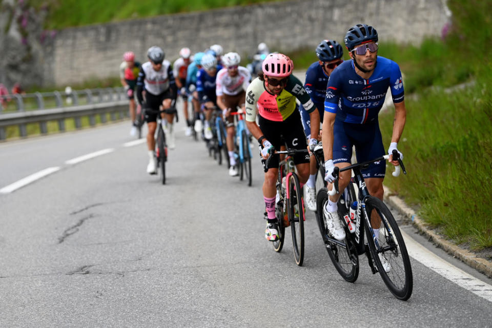 CRANSMONTANA SWITZERLAND  MAY 19 LR Ben Healy of Ireland and Team EF EducationEasyPost and Thibaut Pinot of France and Team Groupama  FDJ compete in the breakaway competes during the 106th Giro dItalia 2023 Stage 13 a 75km stage from Le Chable to CransMontana  Valais 1456m  Stage shortened due to the adverse weather conditions  UCIWT  on May 19 2023 in CransMontana Switzerland Photo by Tim de WaeleGetty Images