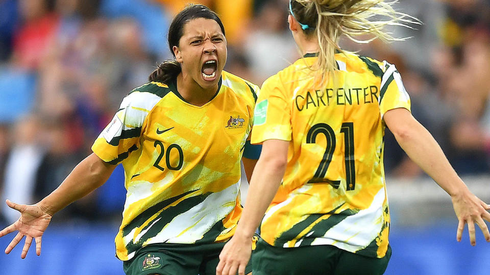 Sam Kerr and Ellie Carpenter celebrate. (Photo by Michael Regan/Getty Images)