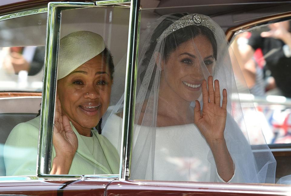 Doria proudly sat by her daughter’s side as they waved to crowds before arriving at the chapel. Photo: Getty