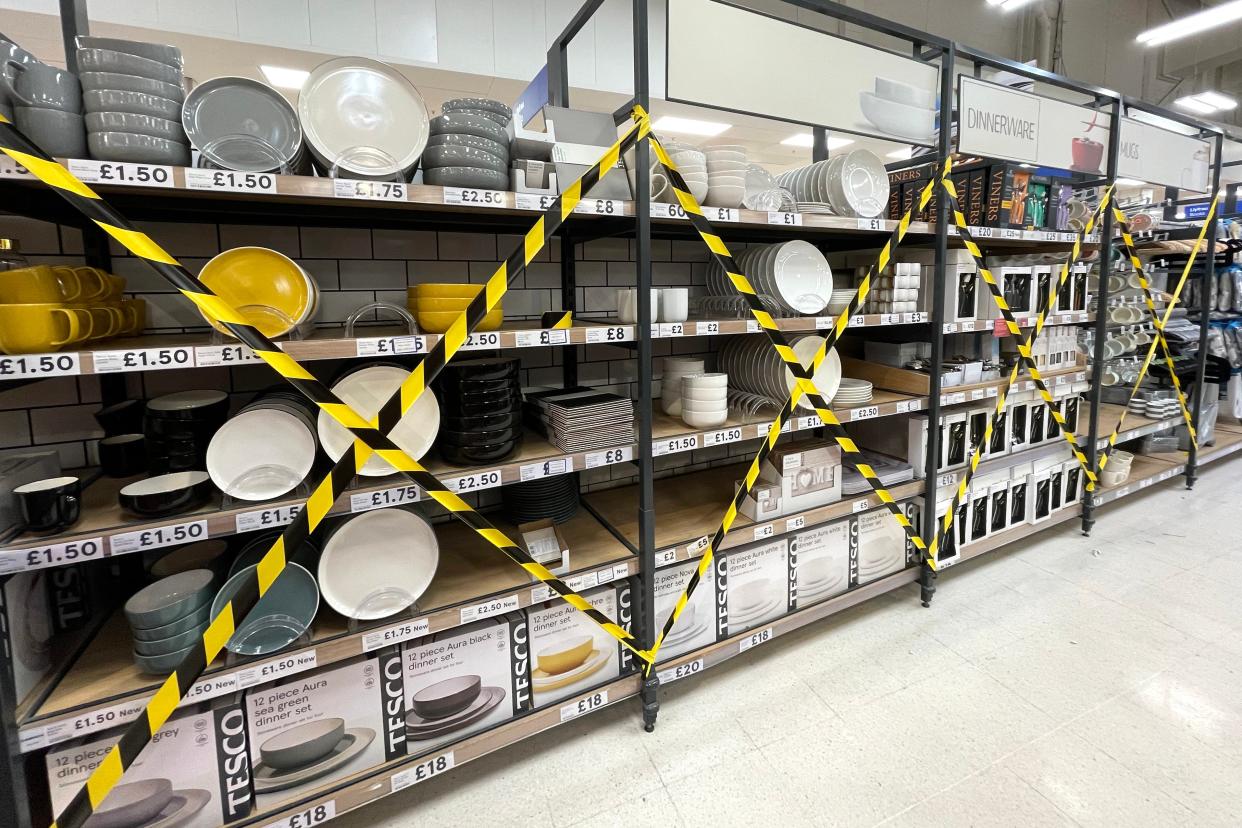 Kitchen products deemed ‘non-essential’ are seen covered up in a Cardiff Tesco store (Getty Images)