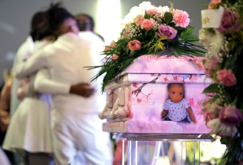 CARSON-CA-DECEMBER 23, 2022: Family members mourn during the funeral service for one-year-old Leilani Dream Burley at City of God Church in Carson on Friday, December 23, 2022. Burley's body was found in the Los Angeles River below the Ocean Boulevard Bridge in Long Beach earlier this month. The child's 22-year-old father Jayveon Burley was arrested on suspicion of murder and child endangerment. (Christina House / Los Angeles Times)