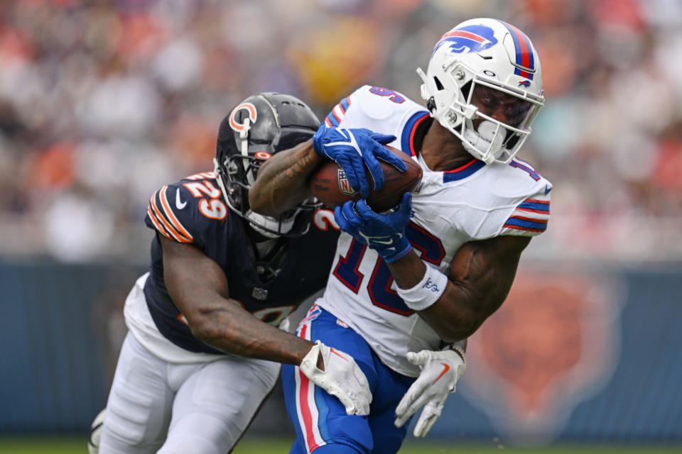 CHICAGO, ILLINOIS - AUGUST 26: Trent Sherfield #16 of the Buffalo Bills catches against Tyrique Stevenson #29 of the Chicago Bears in the first half a preseason at Soldier Field on August 26, 2023 in Chicago, Illinois.