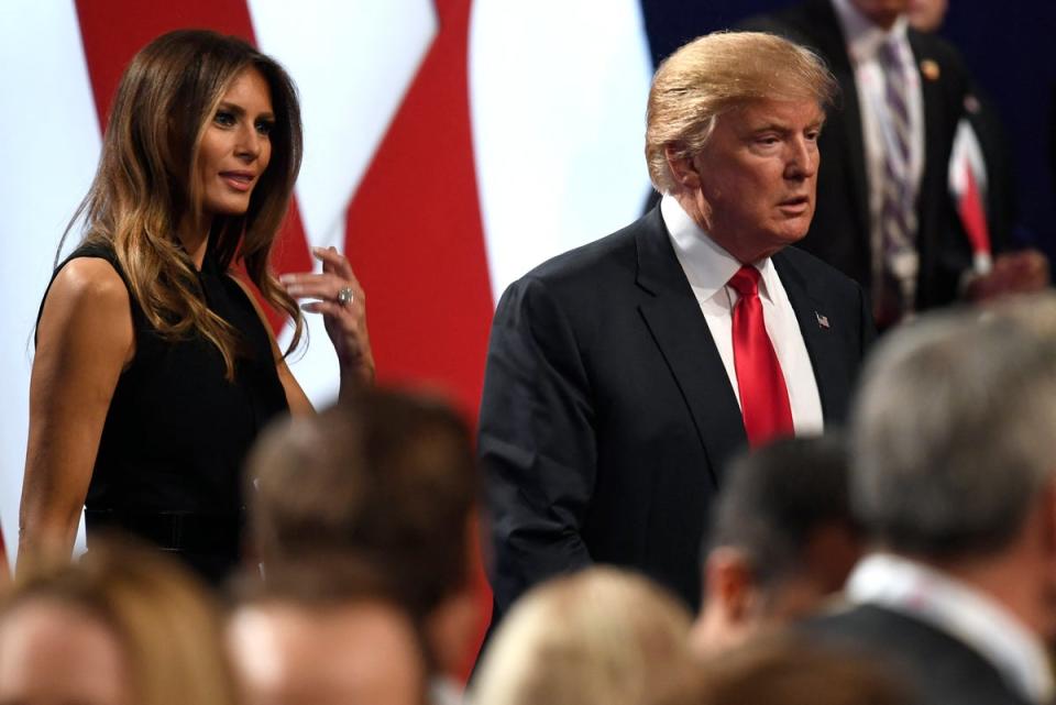 Donald Trump walks off the stage followed by Melania after the final presidential debate of 2016 at the University of Las Vegas in Nevada on 19 October 2016 (AFP/Getty)