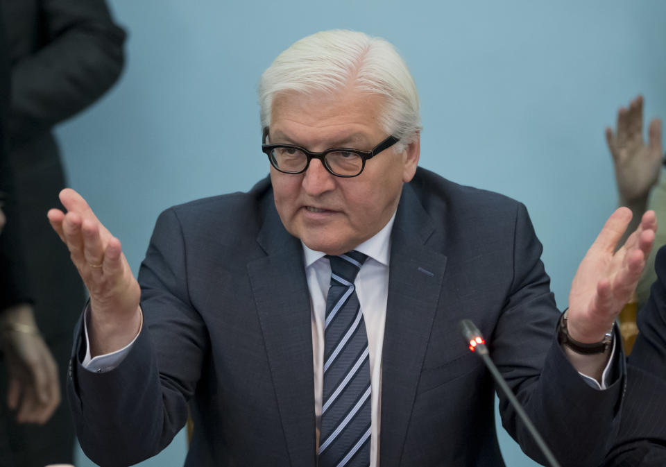 German Foreign Minister Frank-Walter Steinmeier gestures while speaking to Odessa governor Igor Palitsa during a meeting in Odessa, Ukraine, Tuesday, May 13, 2014. Germany’s foreign minister tried to broker a quick launch of talks between Ukraine’s central government and pro-Russia separatists yet Ukraine was skeptical Tuesday and fighting claimed six more lives in the restive east. (AP Photo/(AP Photo/Vadim Ghirda)