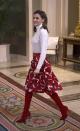 <p>WHO: Queen Letizia of Spain</p> <p>WHAT: Hugo Boss top, Carolina Herrera skirt, Magrit shoes, Tous jewelry</p> <p>WHERE: Welcoming the Spanish Winter Olympic athletes at Zarzuela Palace, Madrid</p> <p>WHEN: March 6, 2018</p>