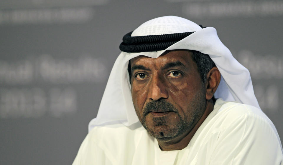 Sheik Ahmed bin Saeed Al Maktoum, Emirates' chairman and CEO, listens during a news conference in Dubai, United Arab Emirates, Thursday, May 8, 2014. The parent company of the Middle East's biggest airline, Emirates, posted an annual profit Thursday of $1.1 billion as it enjoyed a dip in fuel costs and boosted capacity with the addition of two dozen new planes. (AP Photo/Kamran Jebreili)