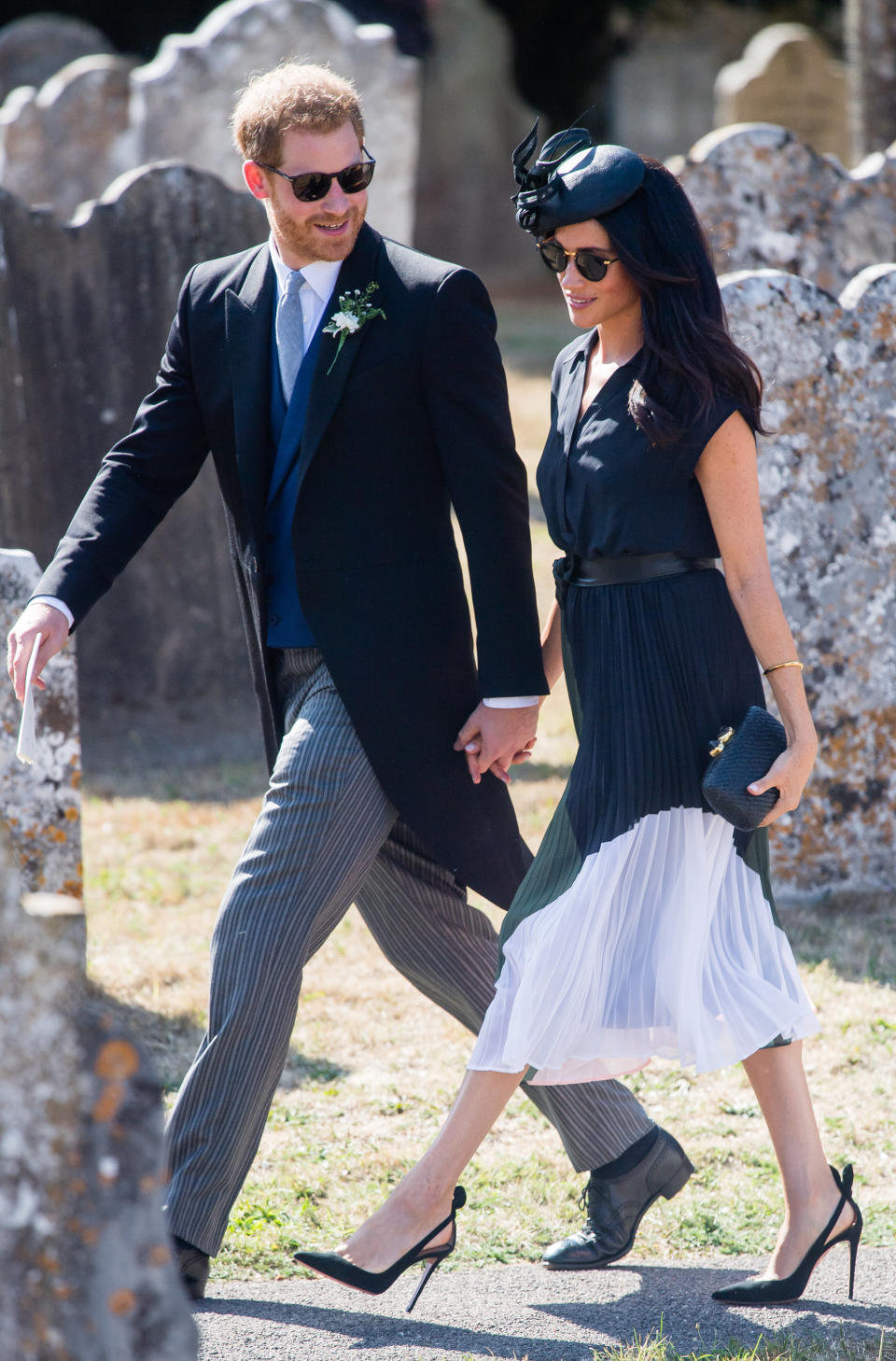 The Duke and Duchess of Sussex attend the wedding of Charlie Van Straubenzee in Frensham, England.