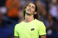 Lloyd Harris, of South Africa, reacts after he defeated Rafael Nadal, of Spain, at the Citi Open tennis tournament Thursday, Aug. 5, 2021, in Washington. Harris won 6-4, 1-6, 6-4. (AP Photo/Nick Wass)