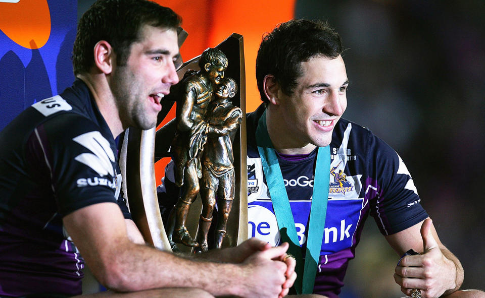 Cameron Smith and Billy Slater with the trophy after the 2009 NRL grand final.