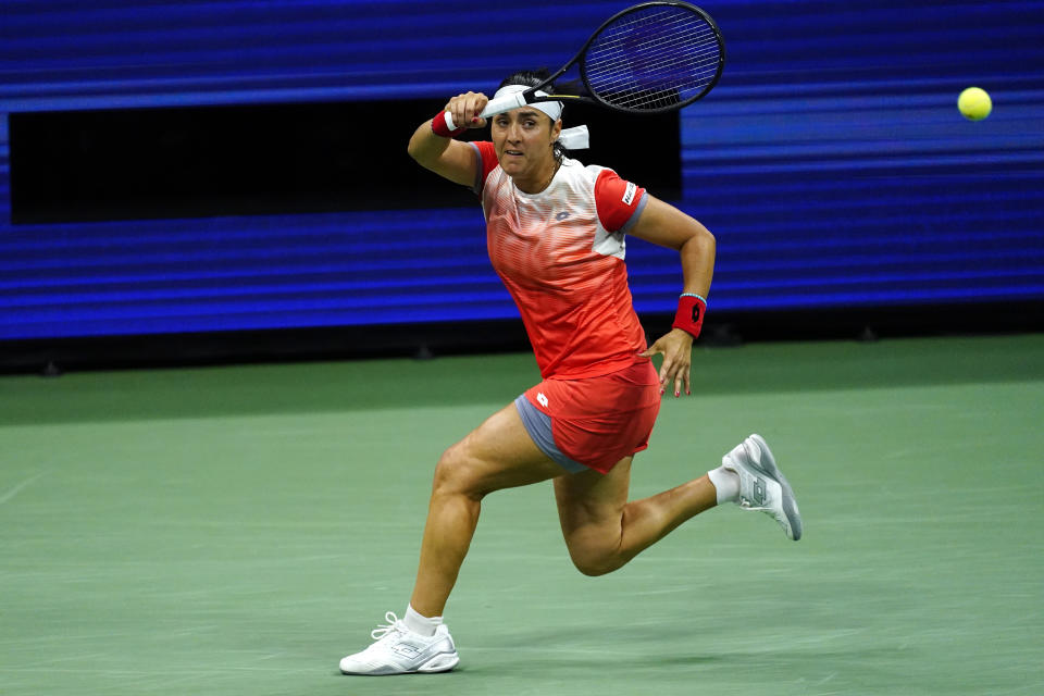 Ons Jabeur, of Tunisia, returns a shot to Caroline Garcia, of France, during the semifinals of the U.S. Open tennis championships on Thursday, Sept. 8, 2022, in New York. (AP Photo/Matt Rourke)
