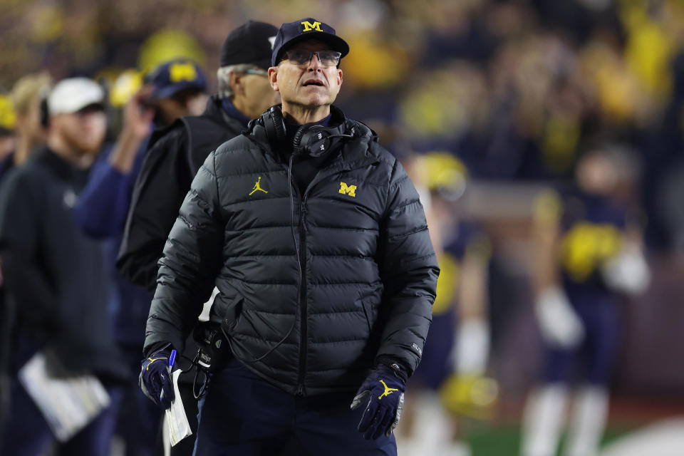 Michigan coach Jim Harbaugh was given a three-game suspension by the Big Ten on Friday. (Gregory Shamus/Getty Images)