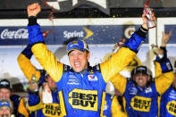 FILE - In this Feb. 28, 2012, file photo, Matt Kenseth celebrates after winning the NASCAR Daytona 500 Sprint Cup series auto race at Daytona International Speedway in Daytona Beach, Fla. Former NASCAR champion Matt Kenseth will once again come out of retirement to compete for Chip Ganassi Racing as the replacement for fired driver Kyle Larson. Larson lost his job two weeks ago for using a racial slur while competing in a virtual race. Ganassi developement driver Ross Chastain was assumed the leading contender to replace Larson but the team instead announced Monday, April 27, 2020, it will go with two-time Daytona 500 winner Kenseth for the remainder of the season. (AP Photo/John Raoux, File)