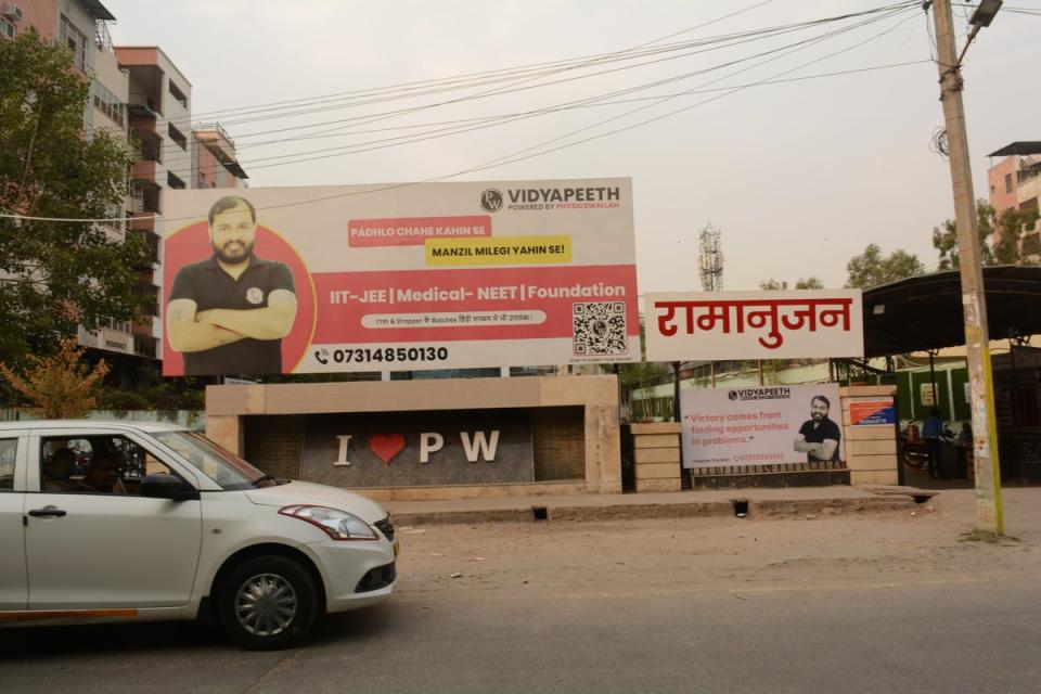 Billboard of a coaching institute publicising their ability to help students crack competitive exams (Namita Singh)