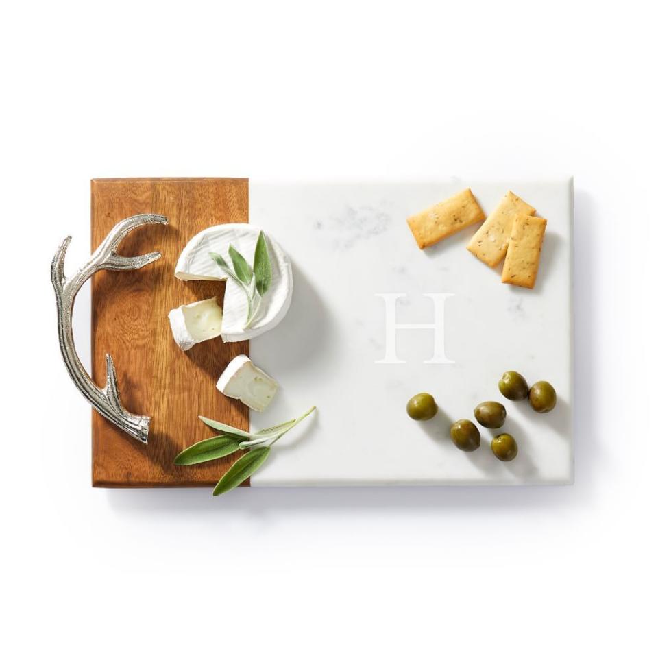 <p><a href="https://go.redirectingat.com?id=74968X1596630&url=https%3A%2F%2Fwww.markandgraham.com%2Fproducts%2Fwood-and-marble-cheese-board-with-antler-handles%2F&sref=https%3A%2F%2Fwww.womenshealthmag.com%2Flife%2Fg35153431%2Fvalentines-day-gifts-for-her%2F" rel="nofollow noopener" target="_blank" data-ylk="slk:Shop Now;elm:context_link;itc:0;sec:content-canvas" class="link ">Shop Now</a></p><p>Wood And Marble Antler Cheese Board</p><p>markandgraham.com</p><p>$69.00</p><span class="copyright">Mark & Graham</span>