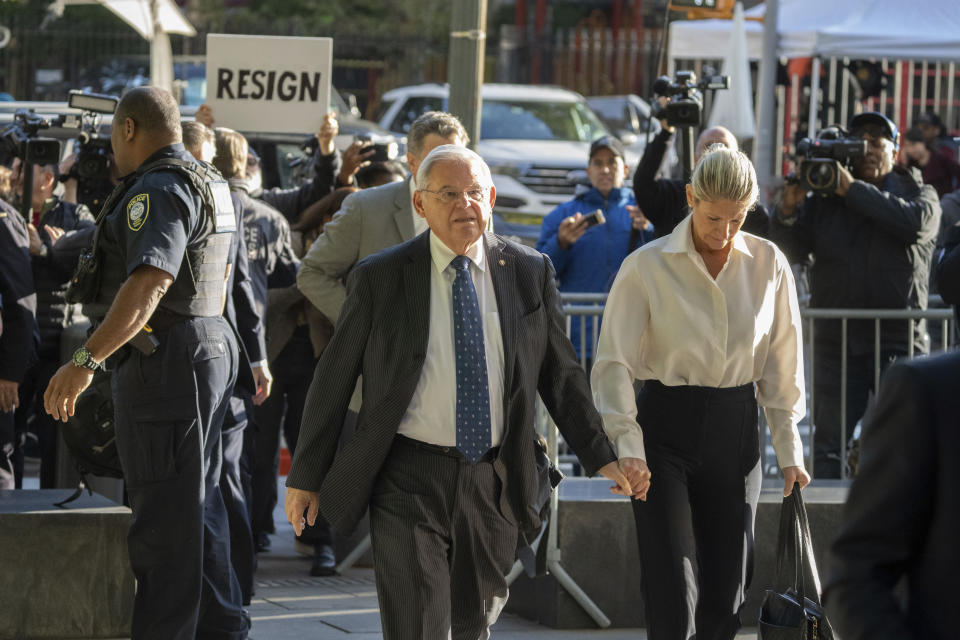 Democratic U.S. Sen. Bob Menendez of New Jersey and his wife Nadine Menendez arrive to the federal courthouse in New York, Wednesday, Sept. 27, 2023. Menendez is due in court to answer to federal charges alleging he used his powerful post to secretly advance Egyptian interests and carry out favors for local businessmen in exchange for bribes of cash and gold bars. (AP Photo/Jeenah Moon)