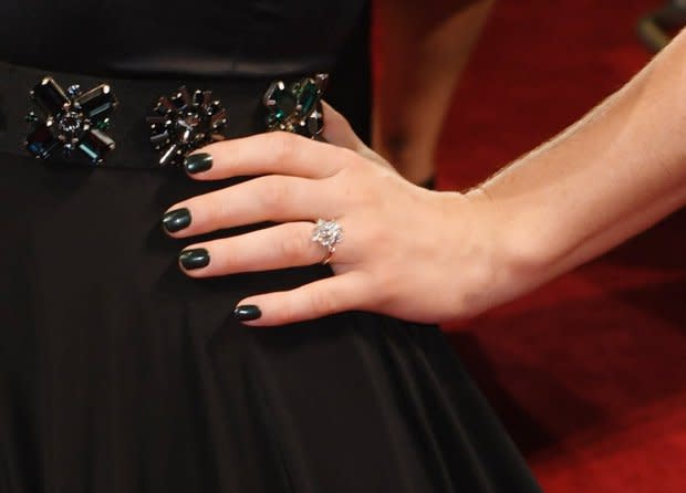 Lily made no attempt to hide her new ring. [picture: David Fisher/BAFTA/REX/Shutterstock]