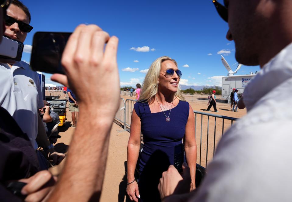 Congresswoman Marjorie Taylor Greene speaks to the press during a rally for Kari Lake, Blake Masters and other Trump ticket candidates on at Legacy Sports Park on Oct. 9, 2022.