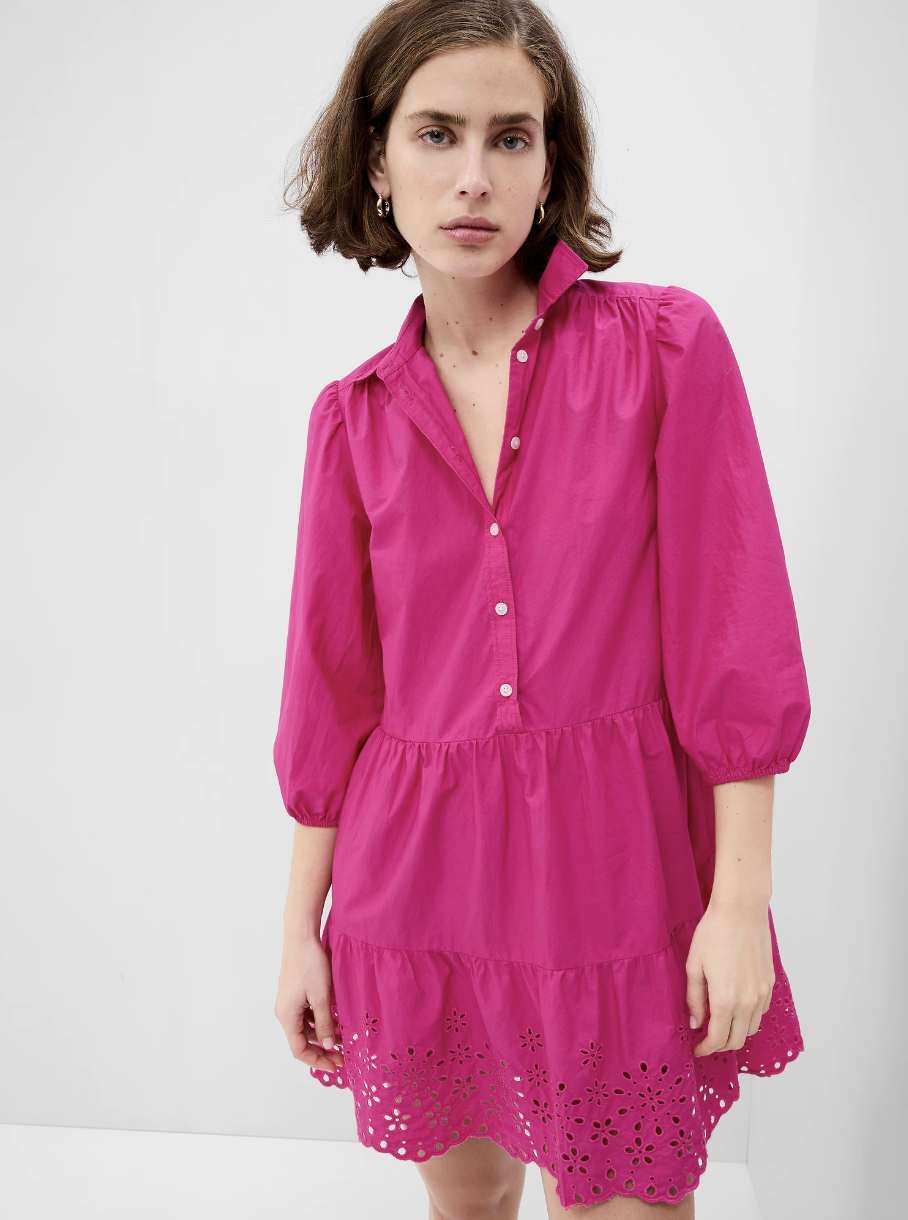 brunette model wearing Puff Sleeve Shirtdress in Viva Magenta Pink (photo via Gap)