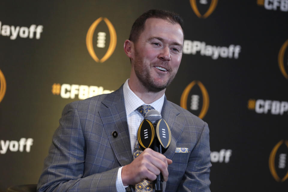Oklahoma head coach Lincoln Riley speaks during a news conference ahead for the College Football playoffs Thursday, Dec. 12, 2019, in Atlanta. Ryan Day of Ohio State was unable to attend. (AP Photo/John Bazemore)