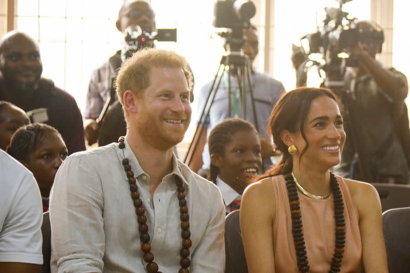 Prince Harry, Duke of Sussex and Meghan, Duchess of Sussex visit Lightway Academy on May 10, 2024 in Abuja, Nigeria