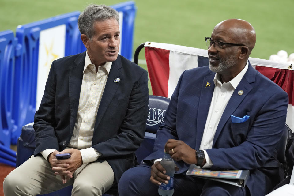 Tampa Bay Rays owner Stuart Sternberg, left, talks to St. Petersburg mayor Ken Welch as the baseball team announced plans for a new stadium during a news conference Tuesday, Sept. 19, 2023, in St. Petersburg, Fla. (AP Photo/Chris O'Meara)