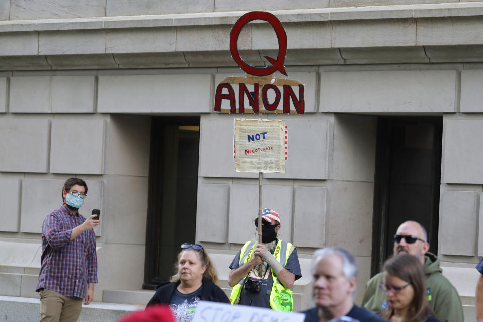 Supporters of the QAnon conspiracy theory, seen here at a May rally in Olympia, Washington, have been behind much of the trafficking misinformation circulating online this summer. (Photo: Ted S. Warren/ASSOCIATED PRESS)